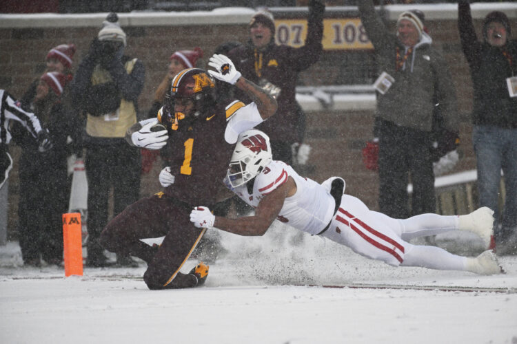 Minnesota keeps Paul Bunyan's Axe with a snowy 17-7 win over Wisconsin, the 4th time in 5 years